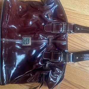 The bag is in good condition, the front strap has minor defects-see pictures.